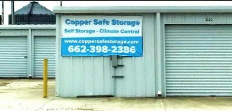 Storage units with a Copper Safe Storage banner on the outside.