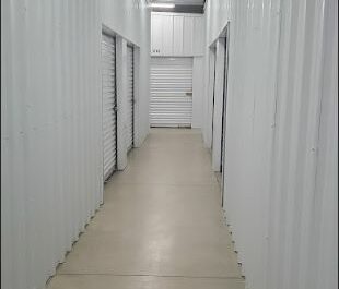 Hallway with storage units.