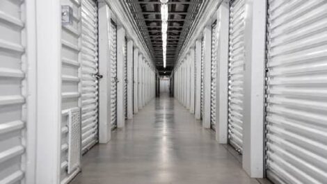 A hallway with storage units.