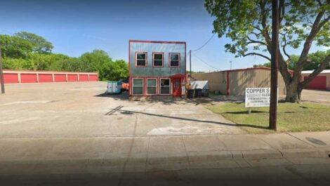 Wide angle from street of building to Copper Safe Storage in Cleburne.
