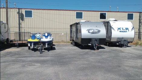 Boats and RVs parked and stored at Storage Depot of Utah in Layton.