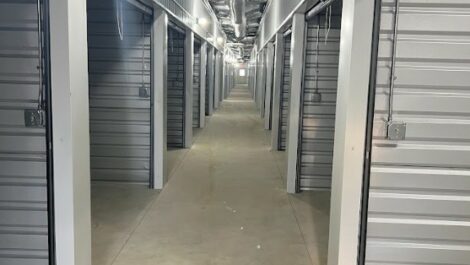 Indoor hallway of empty storage units at Moultrie Road Self Storage in Thomasville.