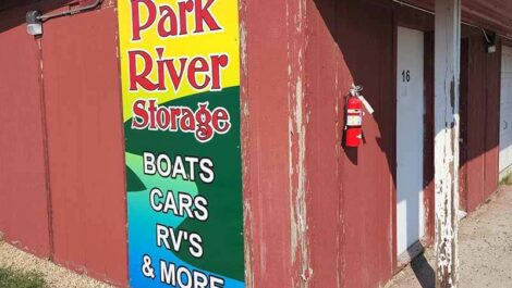 Sigen on side of building Park River Storage Boats Cars RV's & More at Park River Storage in Stevensville.