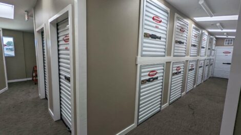 Hall way of mini indoor storage units at Rocket Self Storage in San Diego.