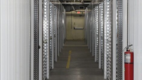 View of hallway and indoor storage units at Spartanburg Climate Storage facility.