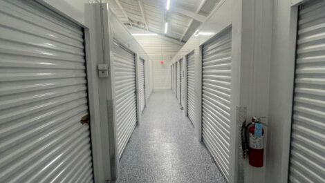 Indoor hallway of storage units at Apalachee Storage in Tallahassee.