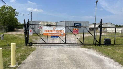 Locked security gate for storage facility in Nederland, TX.