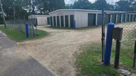 Entry to storage facility with security gate in Columbia, MS.