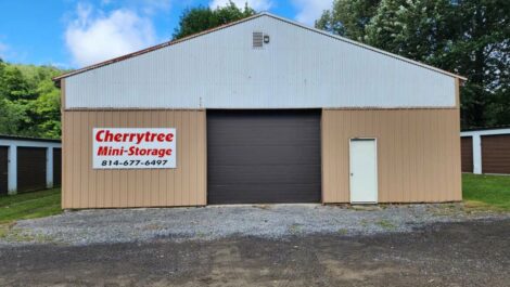 Drive up storage unit with signage for Cherry Tree mini storage in Titusville, PA.