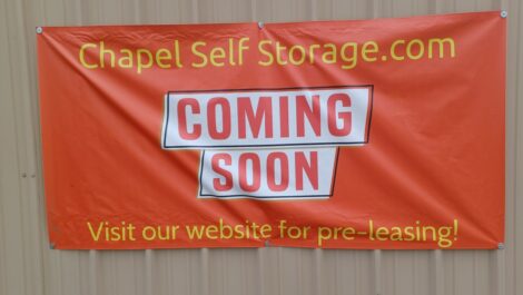 Coming soon signage for Chapel Self Storage in Pine Bluff, AR.