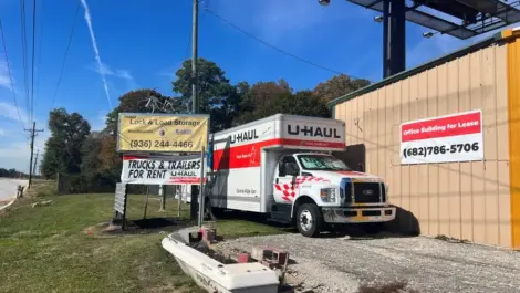 Exterior of Lock and Load Storage, view of Uhaul truck.