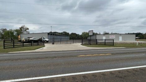 Gated entrance at Rethink Self Storage in Hamshire, TX.