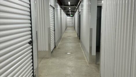 Interior of self-storage facility, with a view of units.