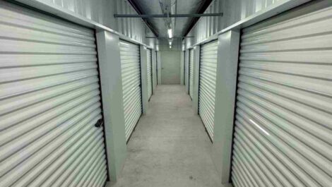 Hallway view of indoor storage units next to units 544 and 571.