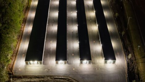 Aerial view of 49 Self Storage at night with well-lit driveways between storage units.