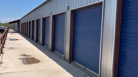 View of exterior of outdoor storage units at The Compound Self Storage.