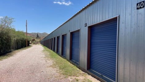 View of exterior of outdoor storage units at The Compound Self Storage.