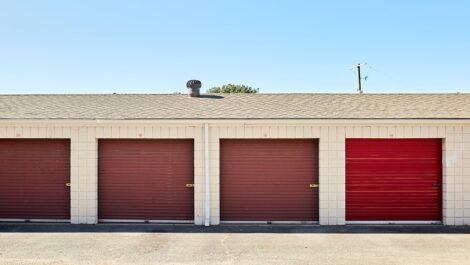 Storage units with red doors.