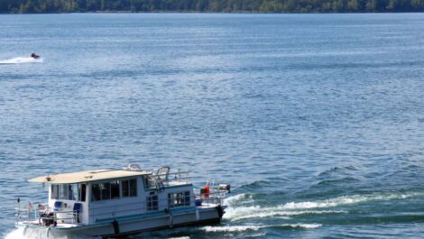 A boat cruises on Table Rock Lake in Branson, MO.
