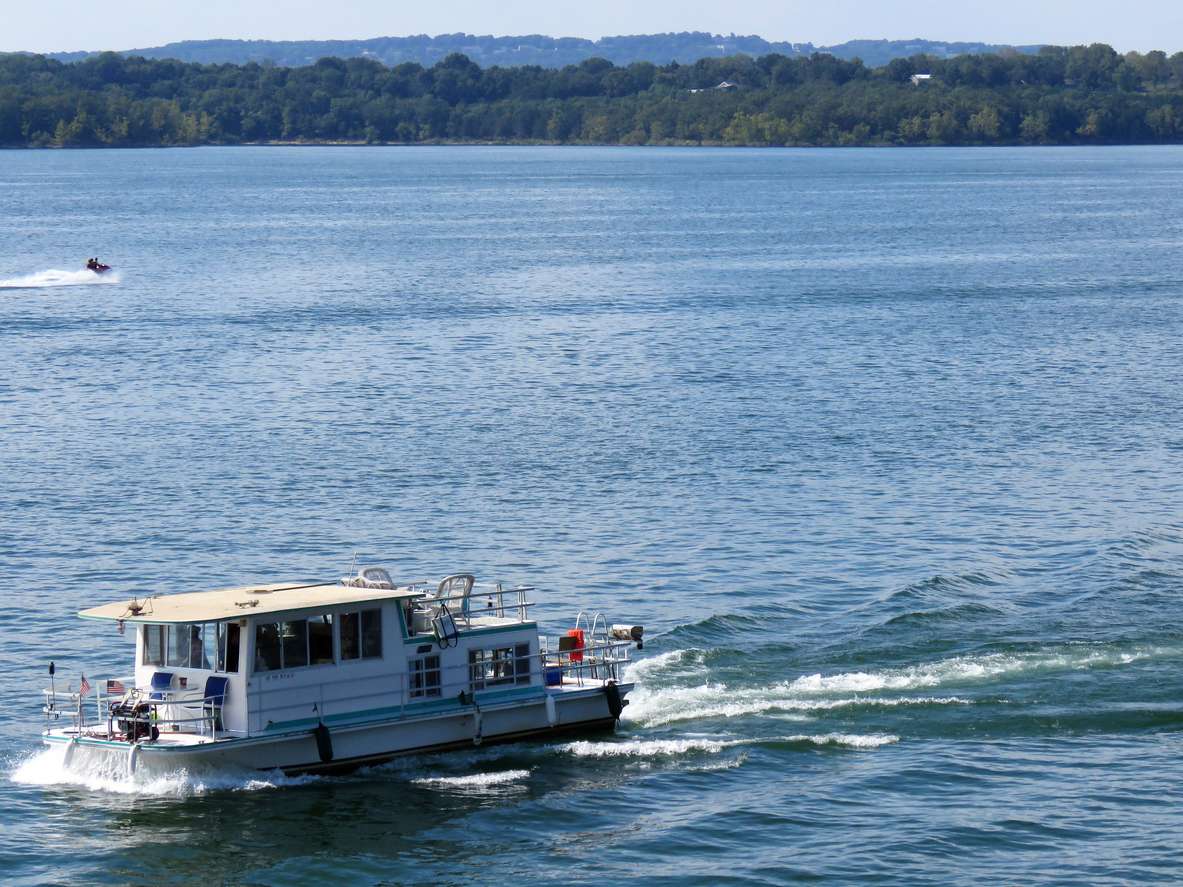 A boat cruises on Table Rock Lake in Branson, MO.