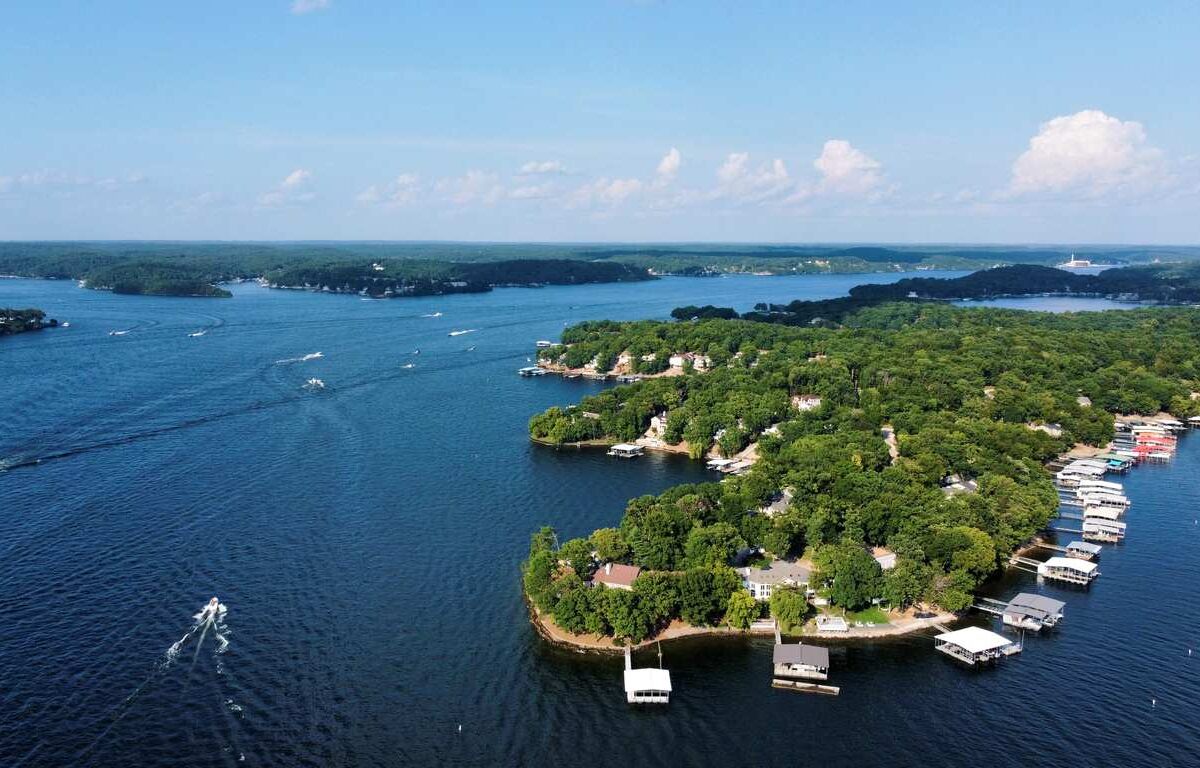 An aerial view of fall foliage over Lake of the Ozarks near Branson, MO.