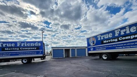 View of moving trucks at True Friends Moving and Storage Facility.